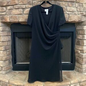 J. B. S. LTD. Black dress. Sleeves are sheer. Dress is lined. Size 18